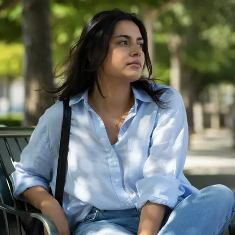 Dappled park portrait AI preview with shallow depth of field and natural outdoor sunlight